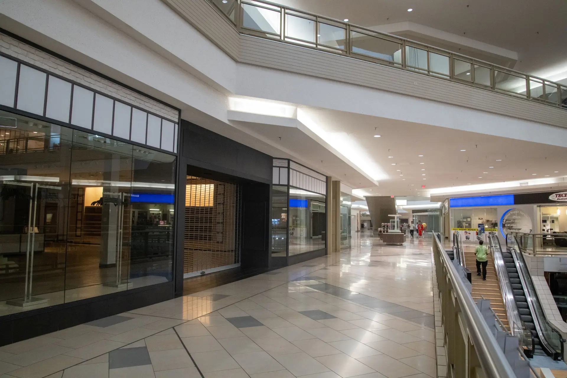 Empty retail storefront interior with a polished floor